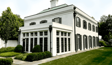historic renovation with custom exterior panel shutters