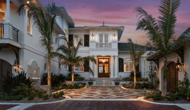 Front entrance of Orchid Beach on Lido Key, FL, with custom wood shutters by Timberlane