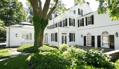 rear elevation of colonial home with timberlane exterior shutters